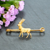 Victorian 9ct yellow gold plain bar with a stag set to the centre. The stag is a beautifully textured gold to reflect the coat of the stag. 