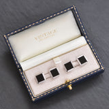 White gold cufflinks. Square cufflinks with an engine turned edge, set with onyx to the centre. Hallmarked and dated Birmingham UK 1927.