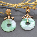Yellow gold fancy jade hoop drop earrings. 