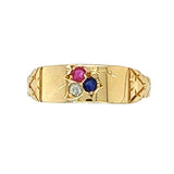 Yellow gold gypsy ring with a single sapphire, ruby and diamond in rub over settings