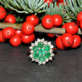 Vintage emerald and diamond cluster ring