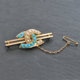 horse shoe brooch