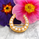 Victorian 15ct yellow gold horseshoe brooch, set with 15 pearls. 