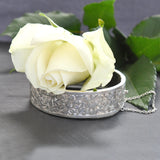 Antique silver bangle with fancy leaf pattern engraved to one half, other half plain. Hallmarked and dated Birmingham UK 1883.