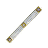 Yellow gold bar brooch with white enamel and three seed pearls.