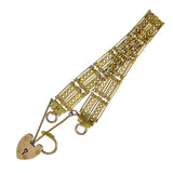 Gold fancy link gate bracelet with padlock attached. Circa 1920.
