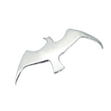 A silver flying bird brooch with a safety catch.