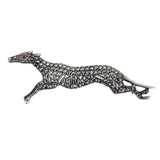 A silver marcasite set greyhound brooch with a safety catch.