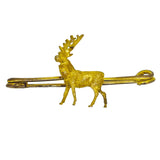 A vintage 9ct yellow gold brooch with a stag design set to the centre.