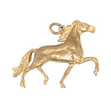 Yellow gold trotting horse pendant.