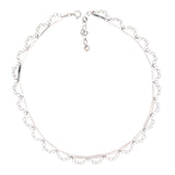 A silver fancy link edge collar necklace with a length of 45 cms and a hallmark of London 1974.