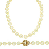 Single row of uniform cultured pearls (appx. 6.75 mm diameter) on 9ct yellow gold clasp set with single pearl.
